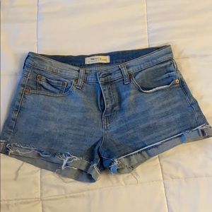 Gap denim 3” shorts. Medium wash. Size 28. Frayed